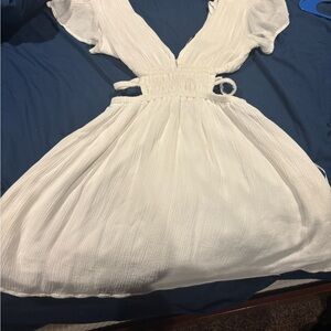 Elegant White Dress with Cut-Out Details